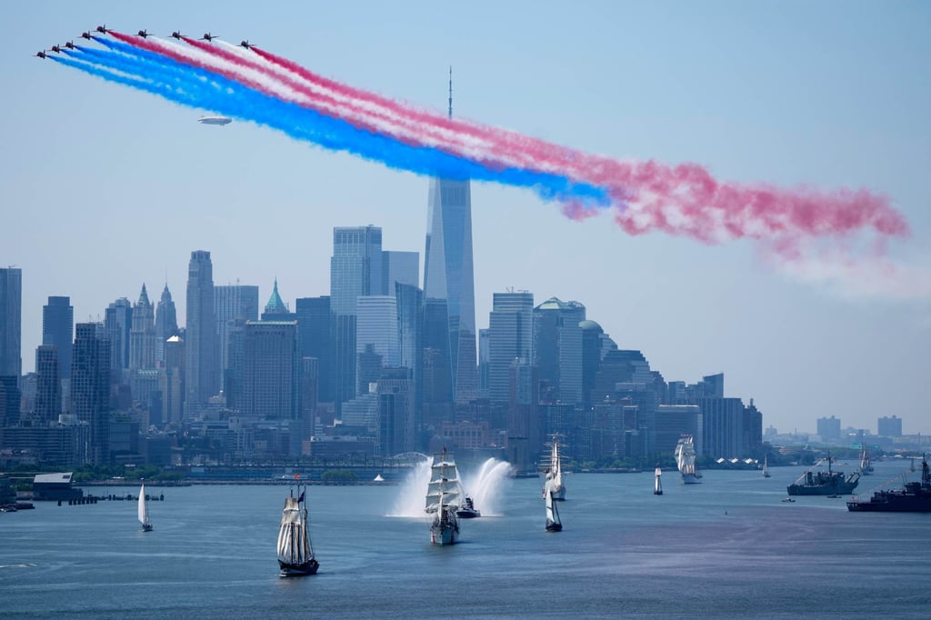 Ships parade under flyovers during the International Parade of Sail in New York on Saturday. Photo: AP