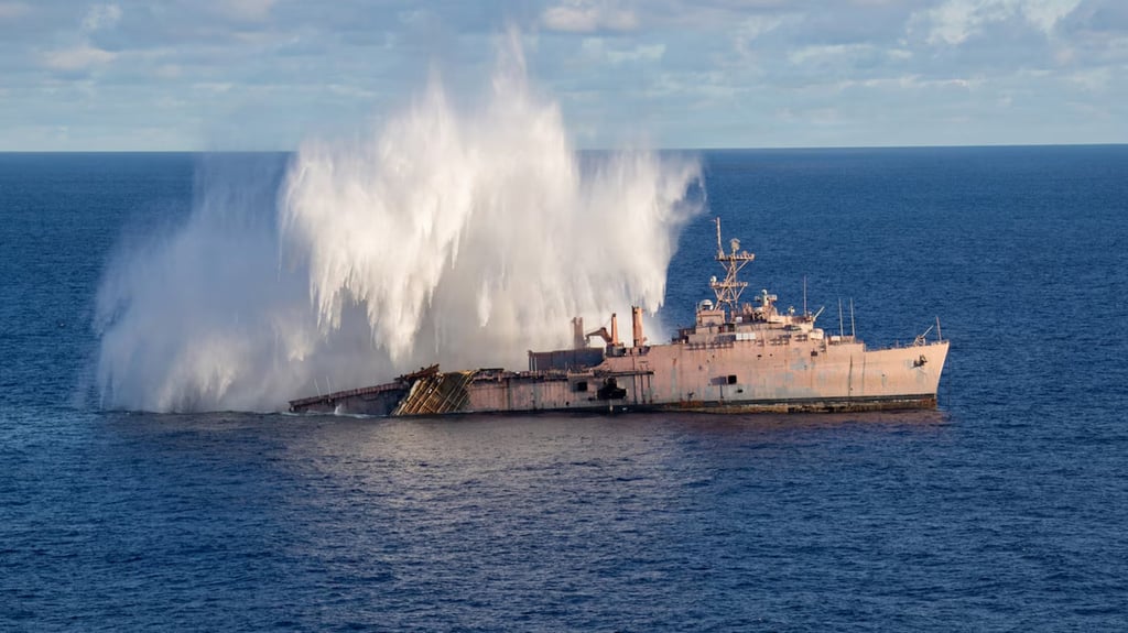 A Japanese submarine fires a torpedo at a decommissioned US warship during a live-fire exercise in the Philippine Sea last month. Photo: US Navy/TNS