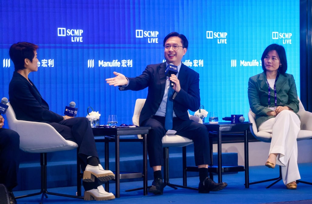 (From left) Jeanne Lim, BeingAI founder and CEO, Hendrick Sin, president of the Hong Kong Internet Professional Association and Zhang Xiaoyan, vice-president of the China Centre for Information Industry Development. Photo: Jonathan Wong