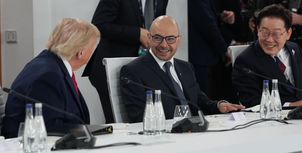 US President Donald Trump (left) talks to South Korea’s President Lee Jae Myung (right) and Black Forest Labs CEO Robin Rombach during a G7 summit meeting on June 17. Photo: AP