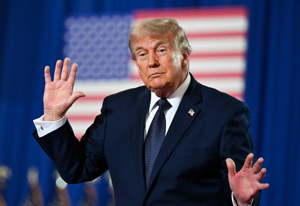 US President Donald Trump dances on stage at SUNY Rockland Community College in May in Suffern, New York. He called the housing bill “a big yawn” compared to voting legislation. Photo: Getty Images via AFP