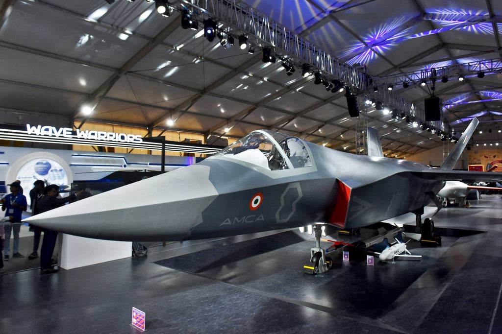 Visitors stand next to a prototype of the Advanced Medium Combat Aircraft at the “Aero India 2025” air show in Bengaluru, India, in February 2025. Photo: Reuters