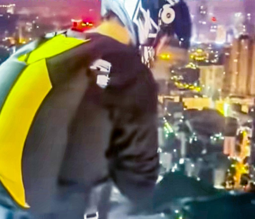 Ren, above, prepping his dangerous night jump, reflecting a broader trend of creators risking their lives for viral fame. Photo: Handout
