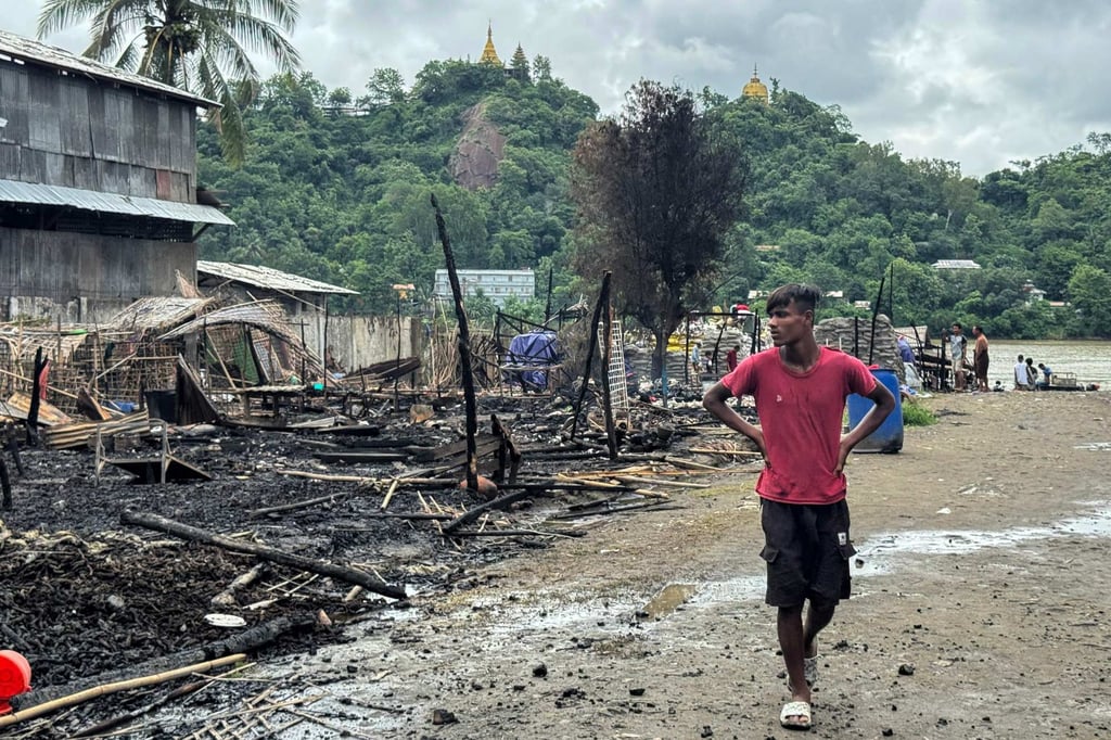 A man walks past the ruins of a building after an air strike by Myanmar’s military in Kyauktaw, western Rakhine State, Myanmar, on June 18, as part of Myanmar’s ongoing civil war. Photo: AFP