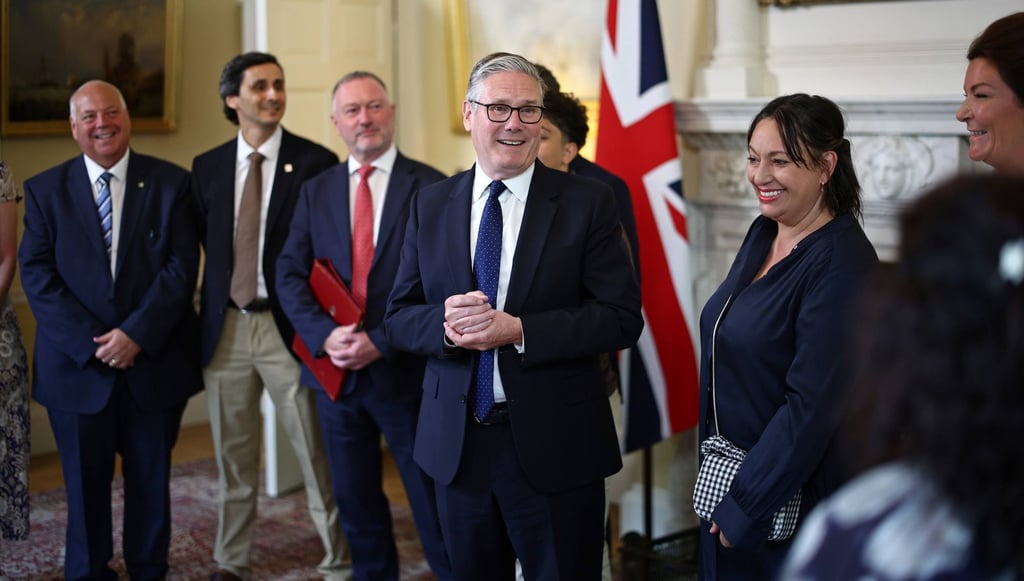 British Prime Minister Keir Starmer meets people whose lives have been improved as a result of decisions made by his government in Downing Street on Wednesday. Photo: dpa
