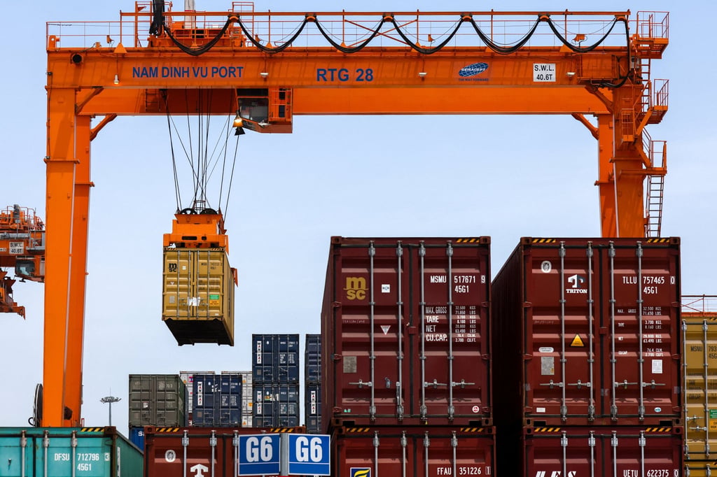 A container is loaded onto a cargo ship while docked at Hai Phong port in Vietnam in April 2025. Photo: Reuters