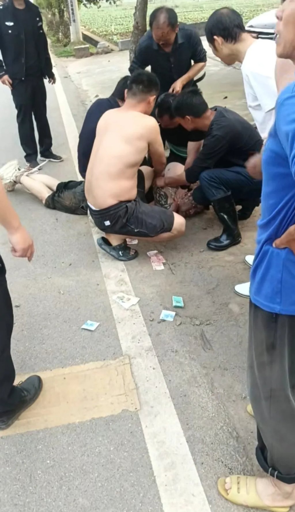 Zeng witnessed a woman under brutal attack and rushed in to save her, leading a group of courageous villagers who helped subduing the attacker. Photo: CCTV