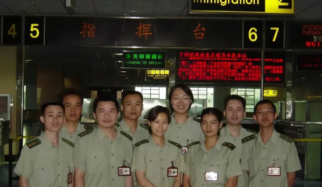 Zhu, third from right, worked closely with Deng, second from right; following his tragic death, she vowed to care for his parents to honour his heroic sacrifice. Photo: ycwb.com