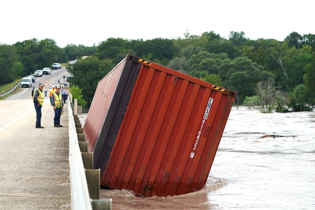 Kendall County officials monitor rising water at the Guadalupe River near Boerne, Texas, on Thursday. Photo: EPA