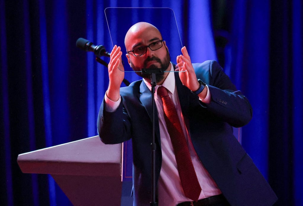 Gabriel Perez checks a teleprompter before Donald Trump arrives to speak in West Palm Beach, Florida, in November 2024. Photo: Reuters