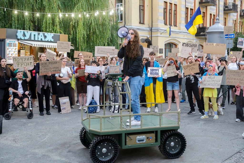 Ukrainians operate an unmanned ground vehicle during a pro-Fedorov protest in Kyiv on Tuesday. Photo: EPA