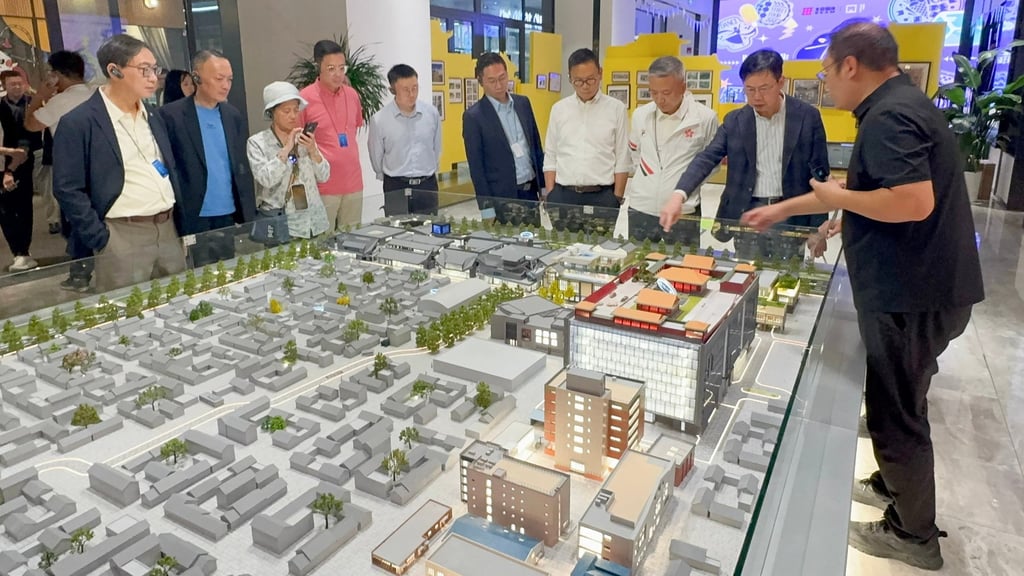 Lawmakers are briefed on work in the Longfu Temple Historical and Cultural District. Photo: Handout