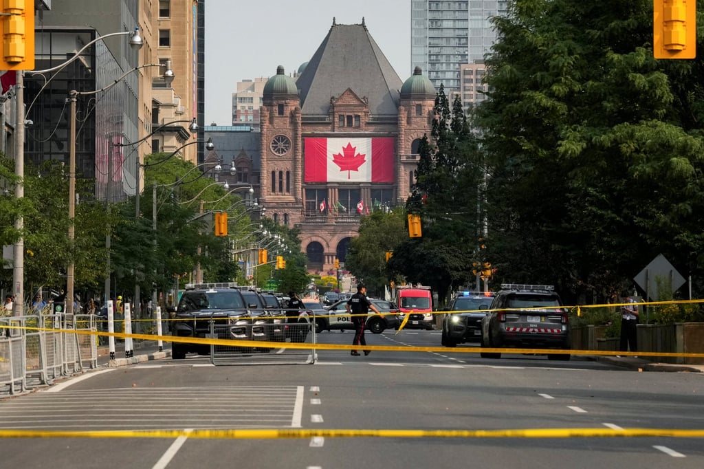 Police tape stretches across University Avenue as Toronto police work at the scene of a shooting at the US consulate in Toronto, Ontario, Canada on Monday. Photo: Reuters