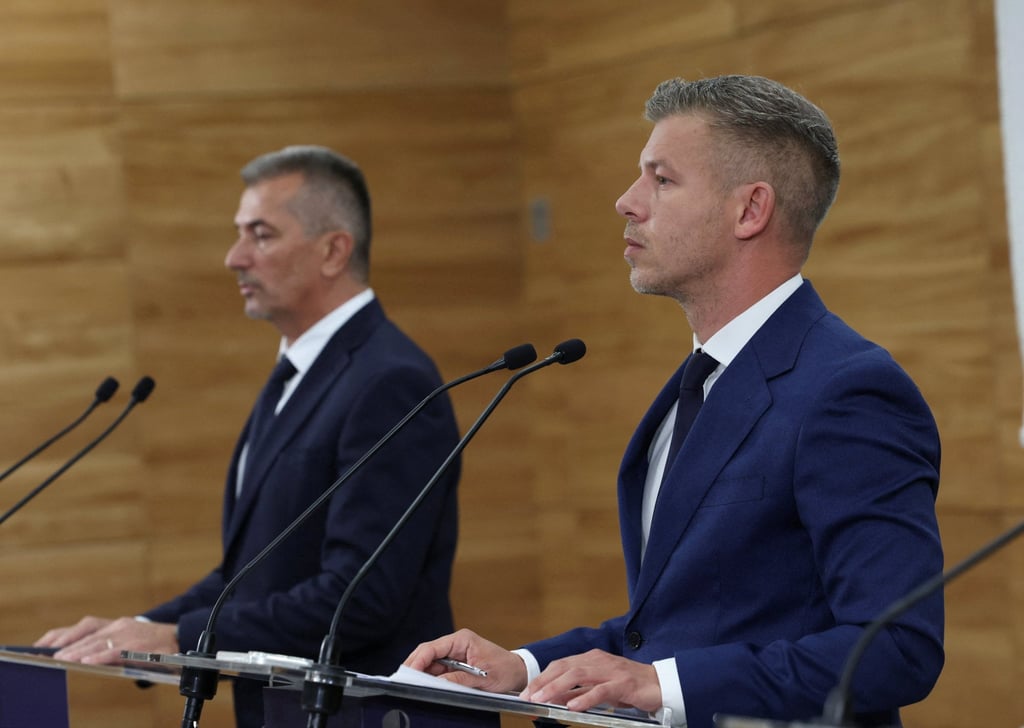Hungarian Prime Minister Peter Magyar (right) and Deputy CEO of Paks Nuclear Power Plant, Laszlo Nagy, attend a press conference on Friday. Photo: Reuters