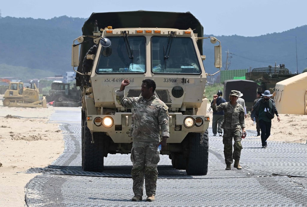 A US Marine leads a military vehicle at a beach during a joint field training exercise conducted by South Korea-US Combined Forces Command in Pohang on July 15. Photo: AFP