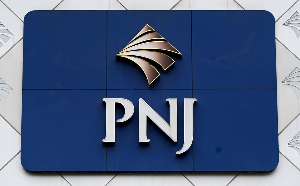 The logo of the Phu Nhuan Jewelry group is displayed at the storefront of a shop in Hanoi on July 15, 2026. Photo: AFP