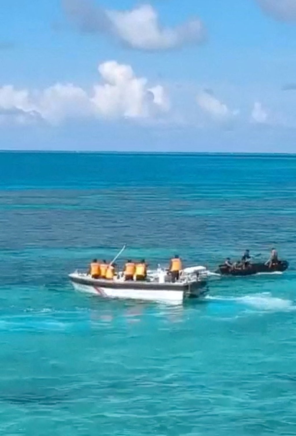 Chinese Coast Guard and Philippine Navy vessels confront each other at the Second Thomas Shoal in the South China Sea on July 20. Photo: Handout/Reuters