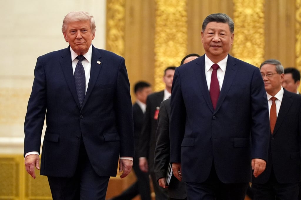 US President Donald Trump (left) and Chinese President Xi Jinping attend a state dinner in Beijing in May. Photo: AP