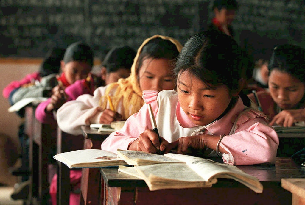 The powerful “Big Eyes” image encapsulates the aspirations of underprivileged Chinese students, sparking nationwide efforts to construct schools and fund educational opportunities. Photo: AFP