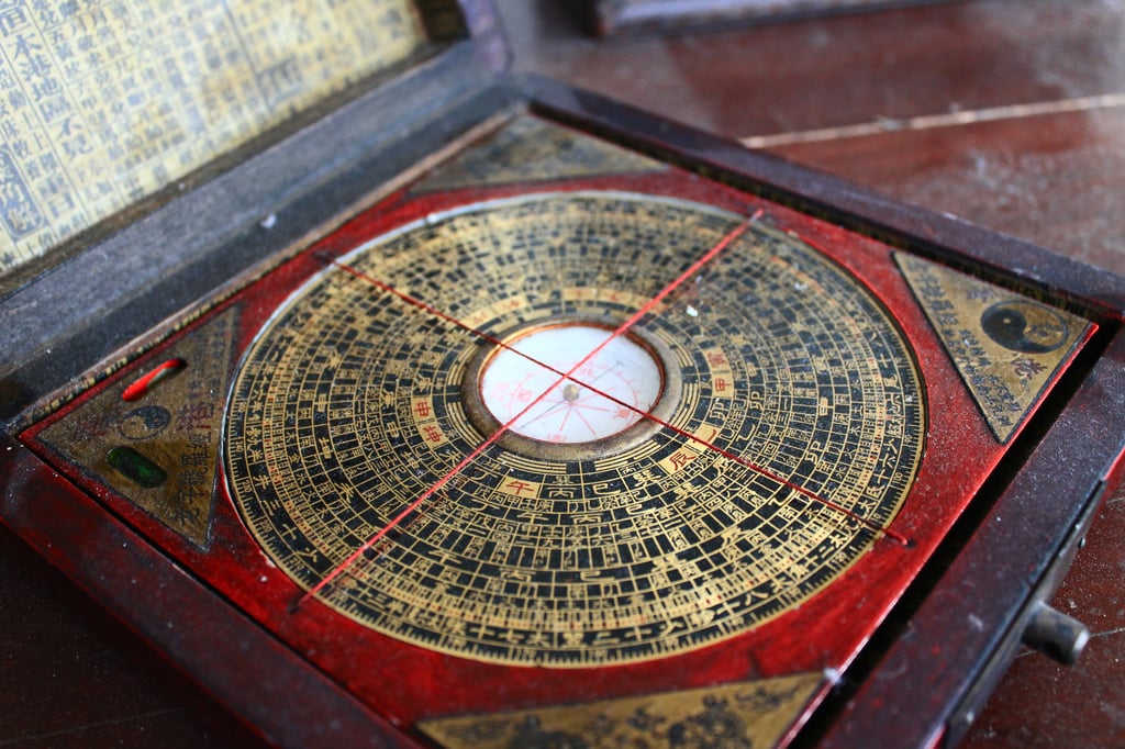 The luo pan, or traditional Chinese compass, transcends mere navigation; it acts as a sophisticated tool for astronomical, cosmic, and metaphysical calculations, underscoring the profound interconnectedness of all things. Photo: Shutterstock
