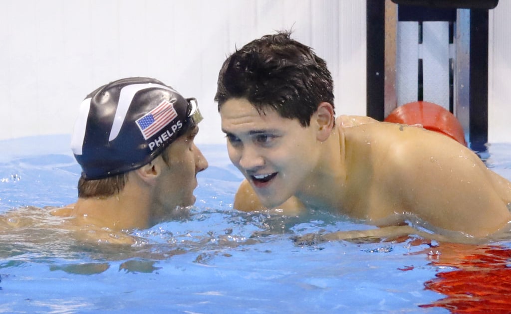 Joseph Schooling of Singapore (right) shares a moment with Michael Phelps of the United States after winning the men’s 100-meter butterfly. Photo: Kyodo