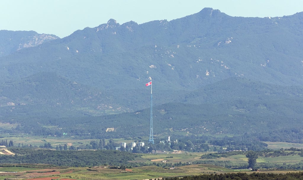 A North Korean flag flies in the North’s Kijong village on the Western border with South Korea, as seen from an observatory in Paju, South Korea, on Wednesday. Photo: Yonhap/EPA