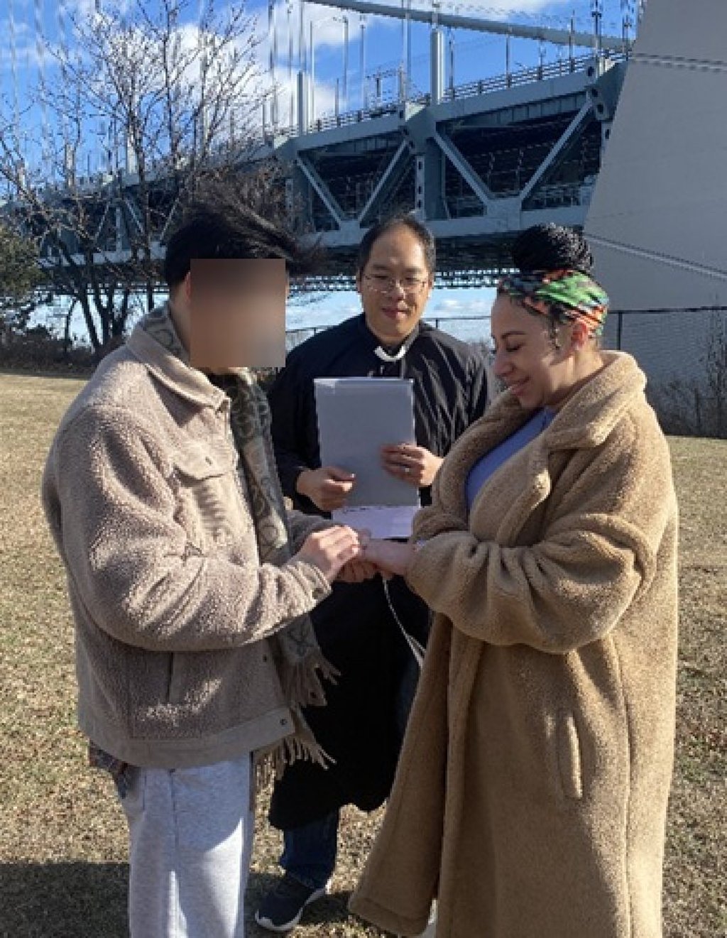 In an image from the US federal court indictment, a foreign national (left), Anthony Cheng (centre) and Erika Johnson take part in a sham marriage ceremony on or about January 15, 2025. Photo: Handout