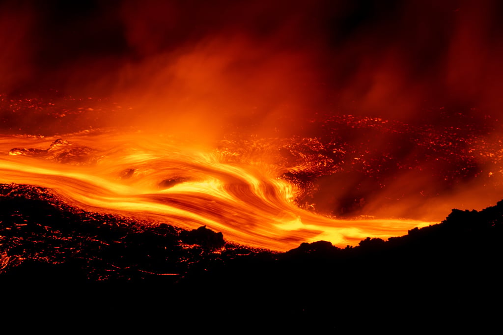 Eruptive activity continues on Mount Etna, as seen from Serracozzo near Catania, Italy, on Tuesday. Photo: AP