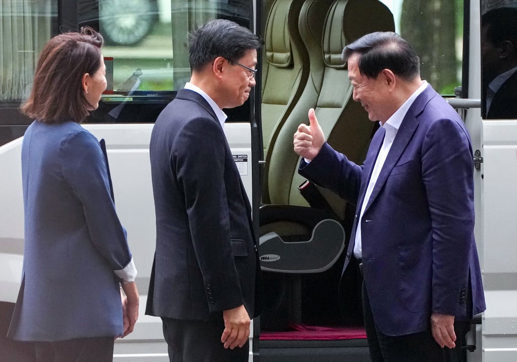 Xia Baolong, director of the Hong Kong and Macau Affairs Office (right), and Hong Kong Chief Executive John Lee at the Shenzhen Bay Control Point on June 17, after Xia’s two-day visit to Hong Kong. Photo: Jelly Tse