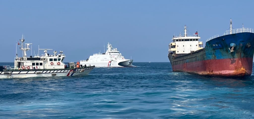 Two Taiwan Coast Guard vessels approach a Togo-flagged cargo ship suspected of damaging a submarine cable on February 25, 2025. Photo: Taiwan Coast Guard/EPA-EFE