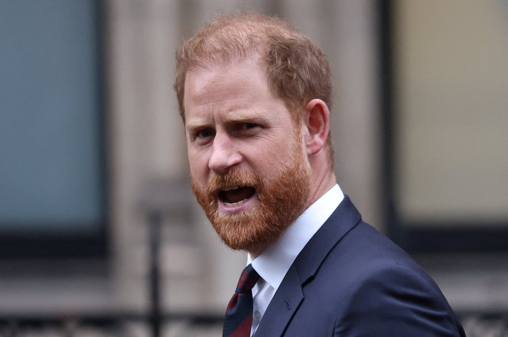 Britain’s Prince Harry reacts as he walks outside the High Court in London in January. Photo: Reuters