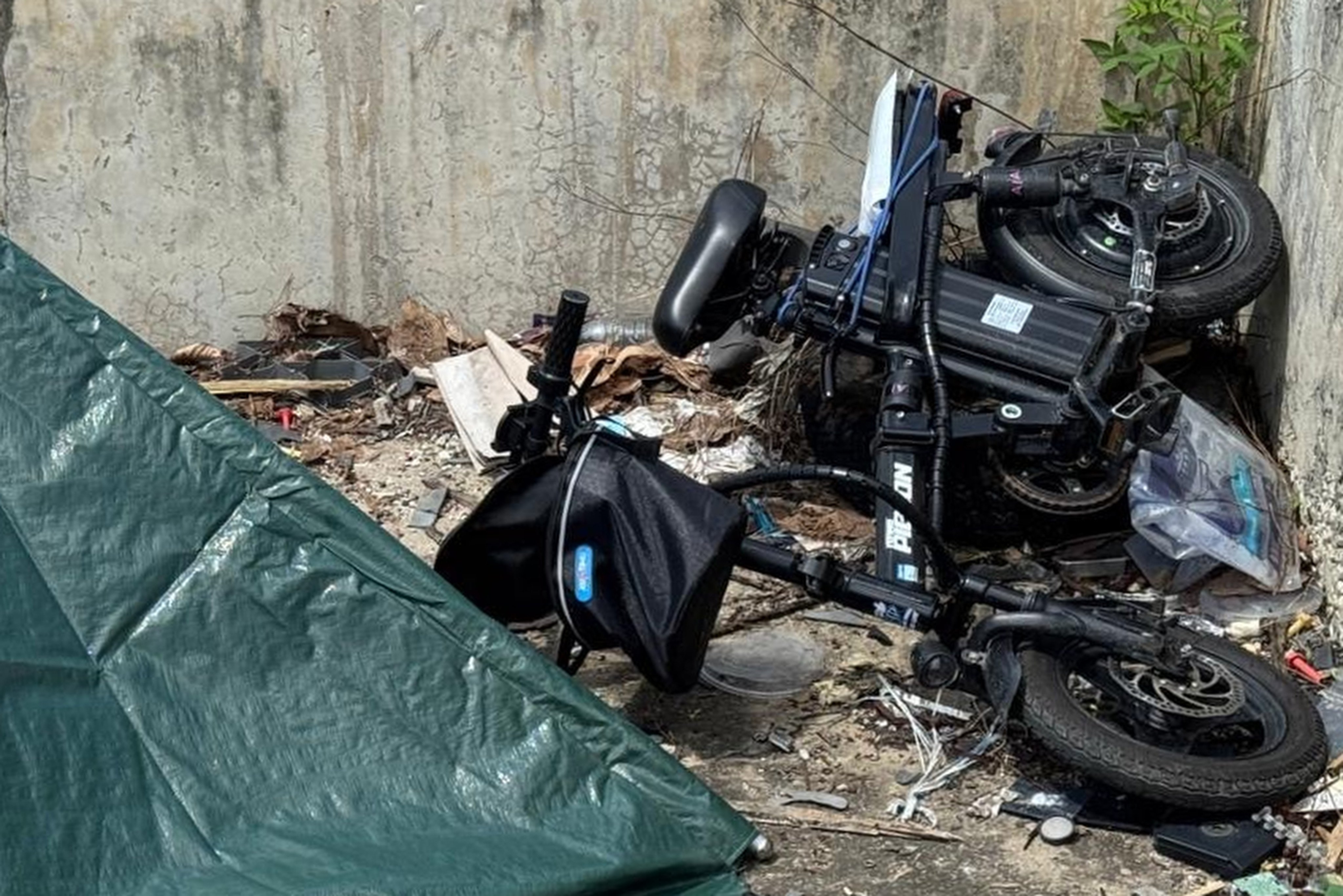 The man was found lying on the ground next to an electric bicycle. Photo: Handout