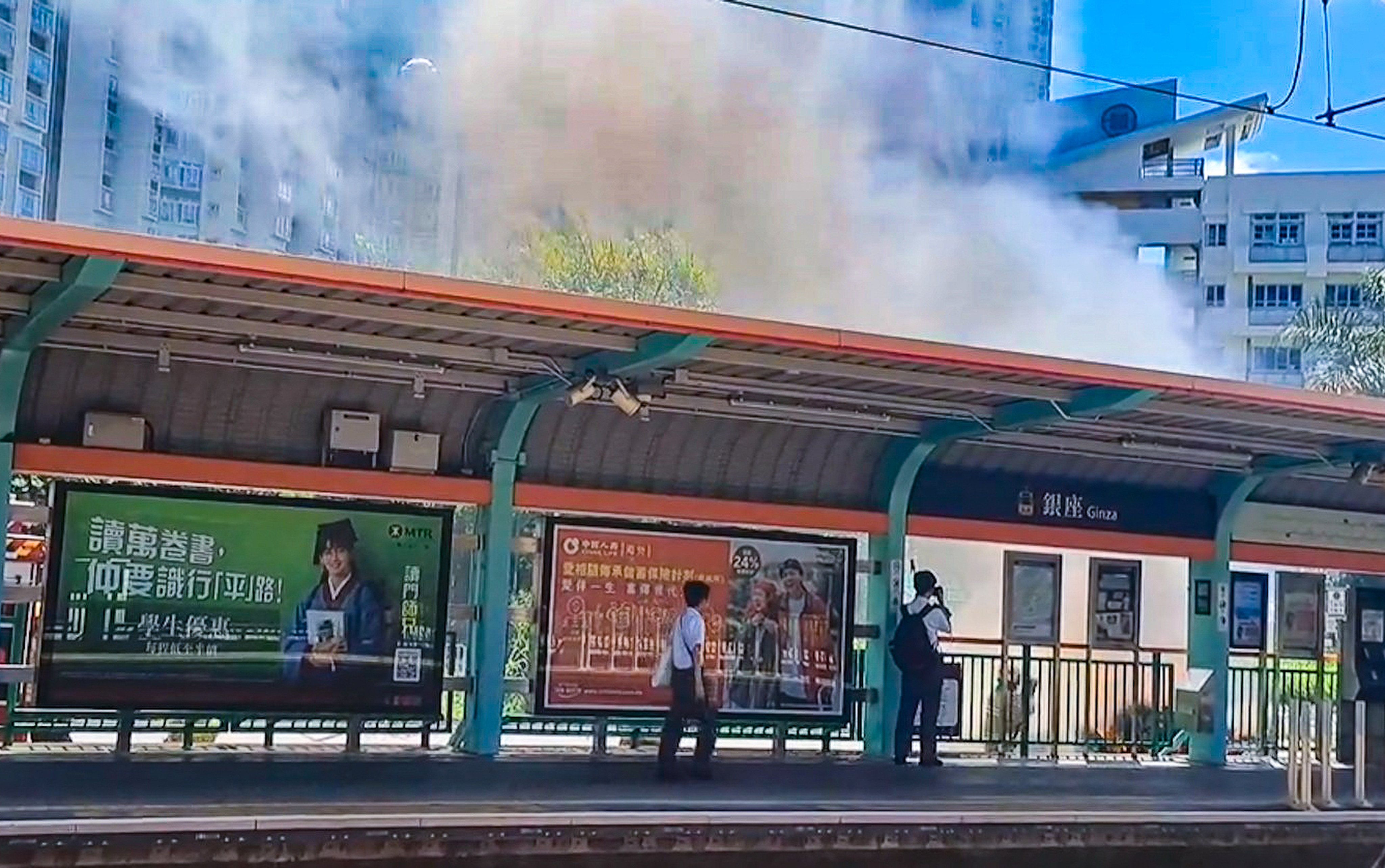 A black Ferrari caught fire near a light rail stop. Photo: Handout