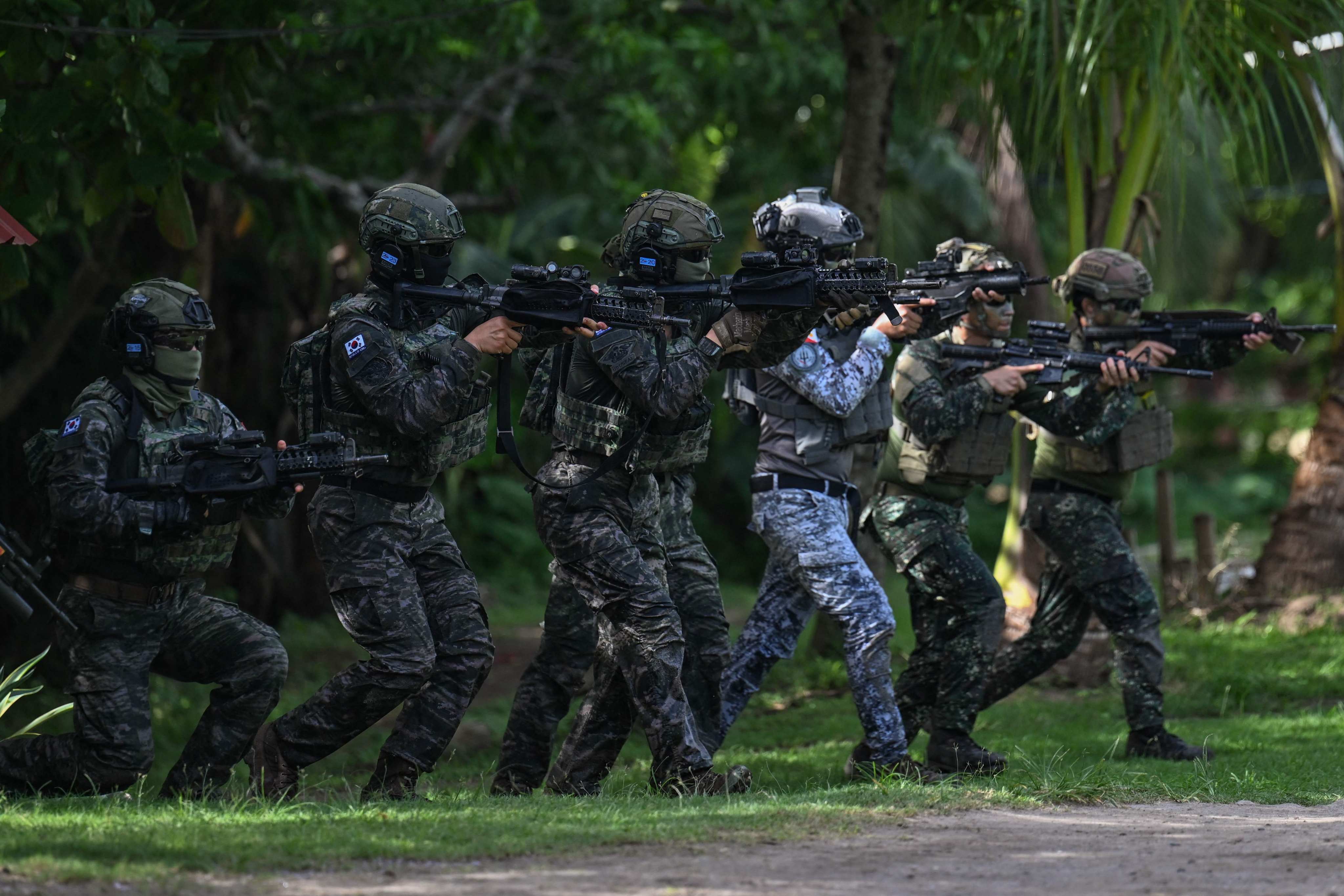 Philippine and South Korean troops participate in an amphibious raid military exercise in Cavite province, west of Manila, on June 20 as part of the annual Philippines-US joint marines exercise dubbed Kamandag (Venom). Photo: AFP