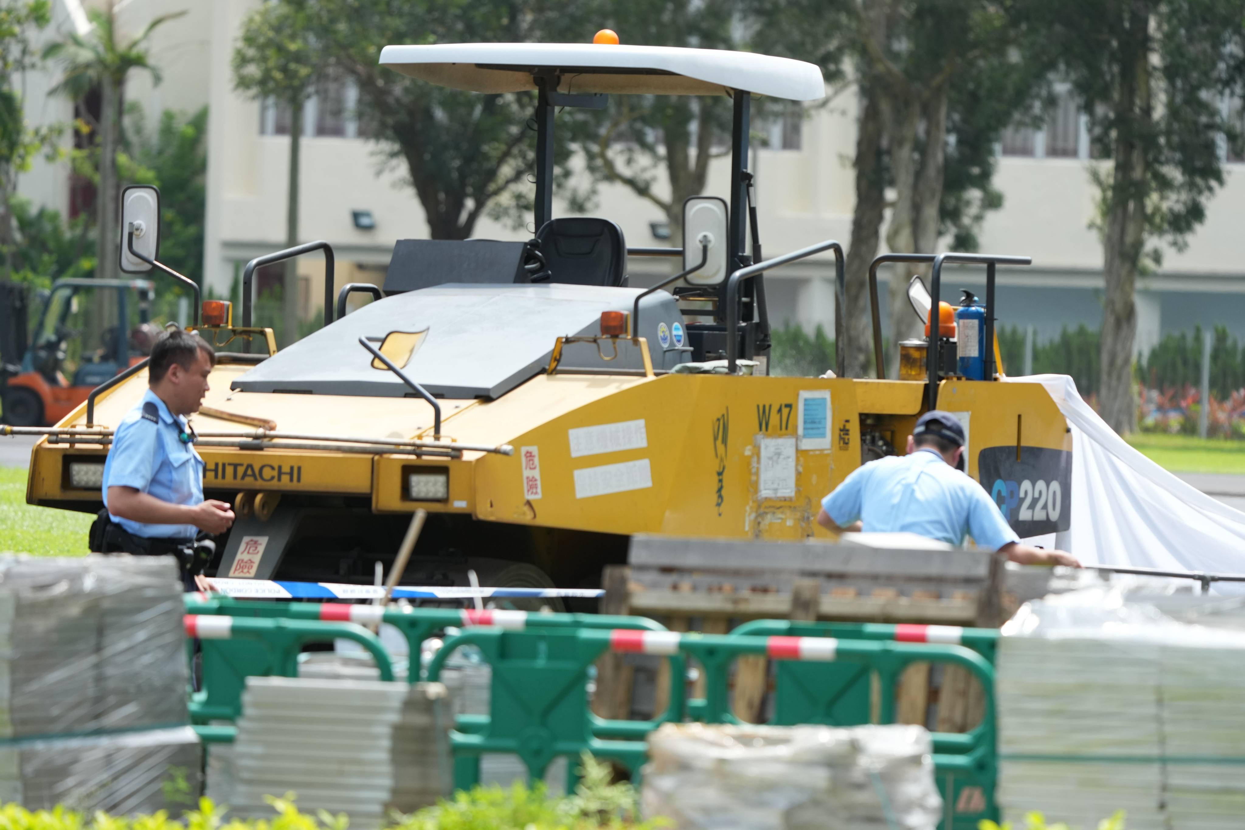 The worker was crushed under the vehicle on the running track at Kowloon Bay Sports Ground. Photo: Dickson Lee