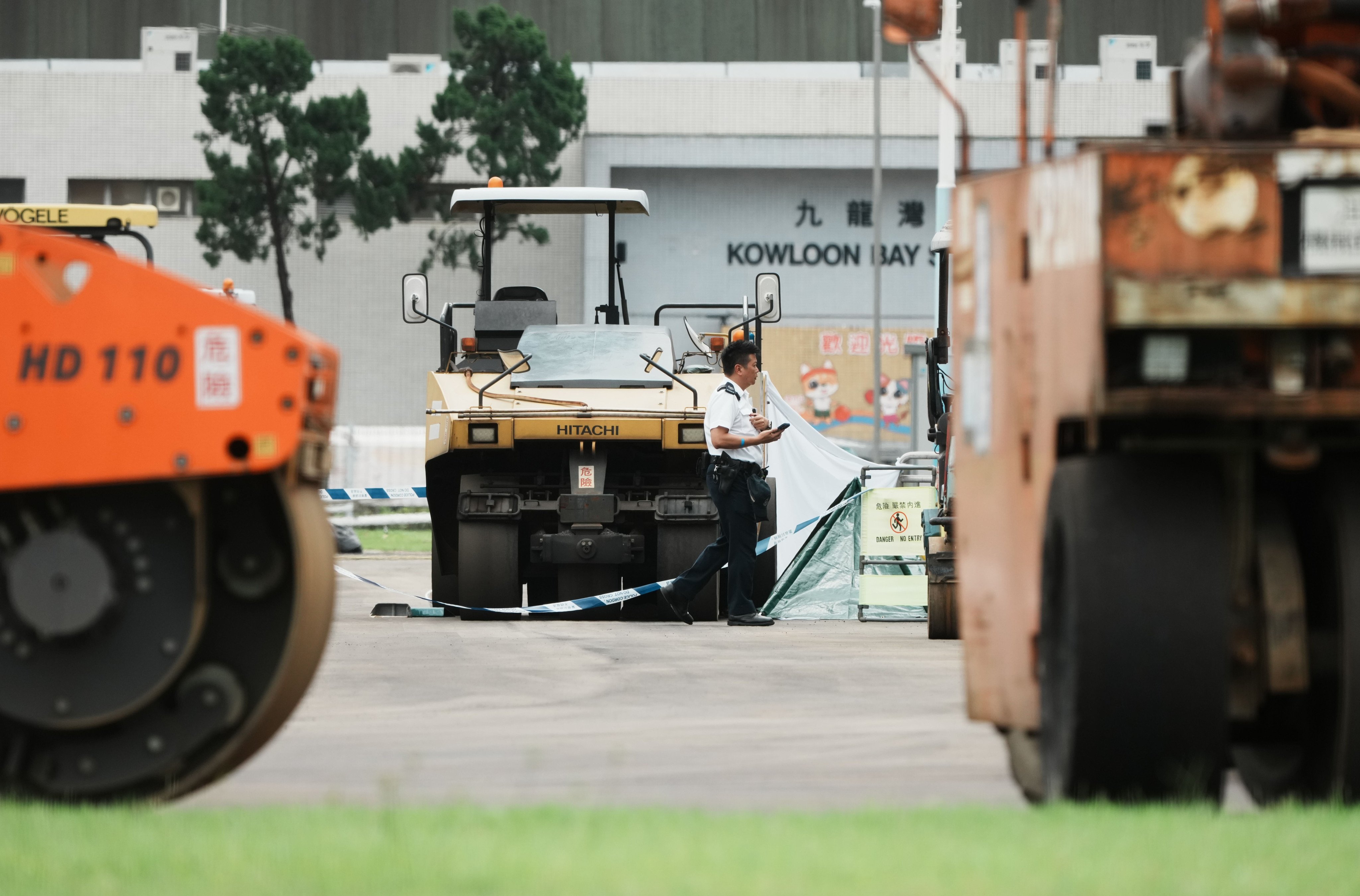 A police officer at the scene of the fatal accident at Kowloon Bay Sports Ground. Photo: Dickson Lee