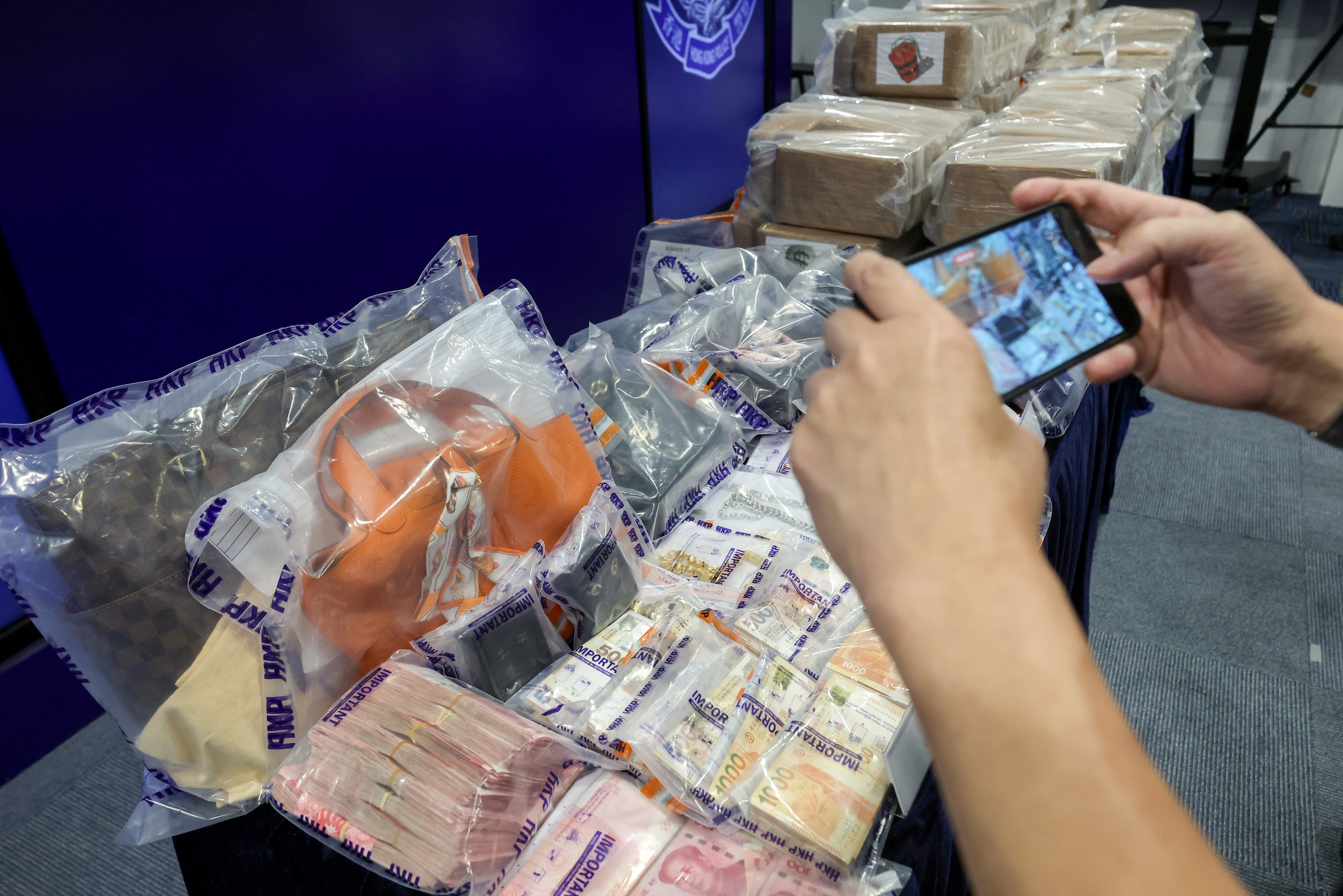 Police seized documents relating to the vessels, alongside cash, jewellery, luxury watches and handbags with an estimated value of HK$2 million. Photo: Edmond So