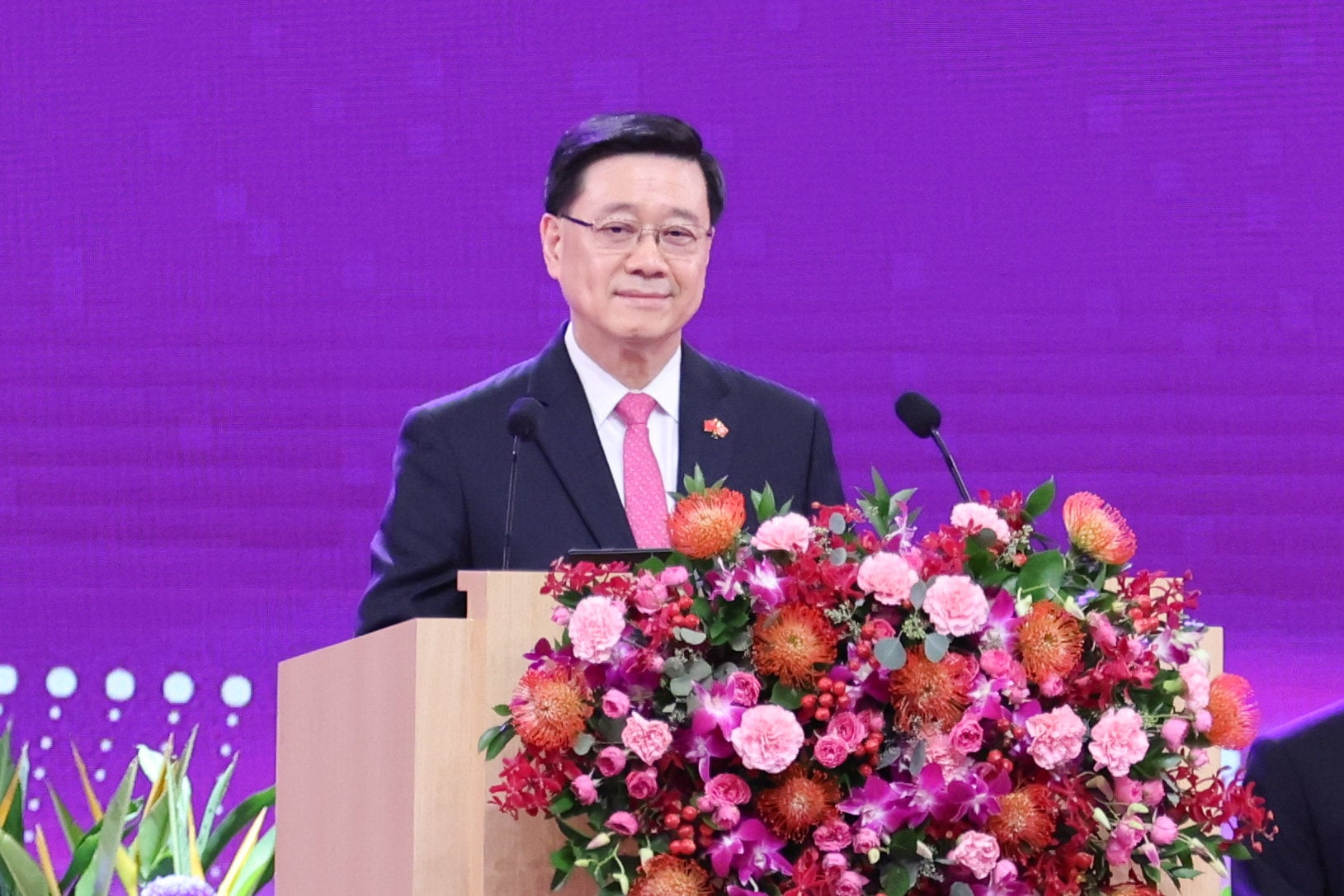 John Lee speaking at the Hong Kong Convention and Exhibition Centre in Wan Chai on Wednesday. Photo: Nora Tam