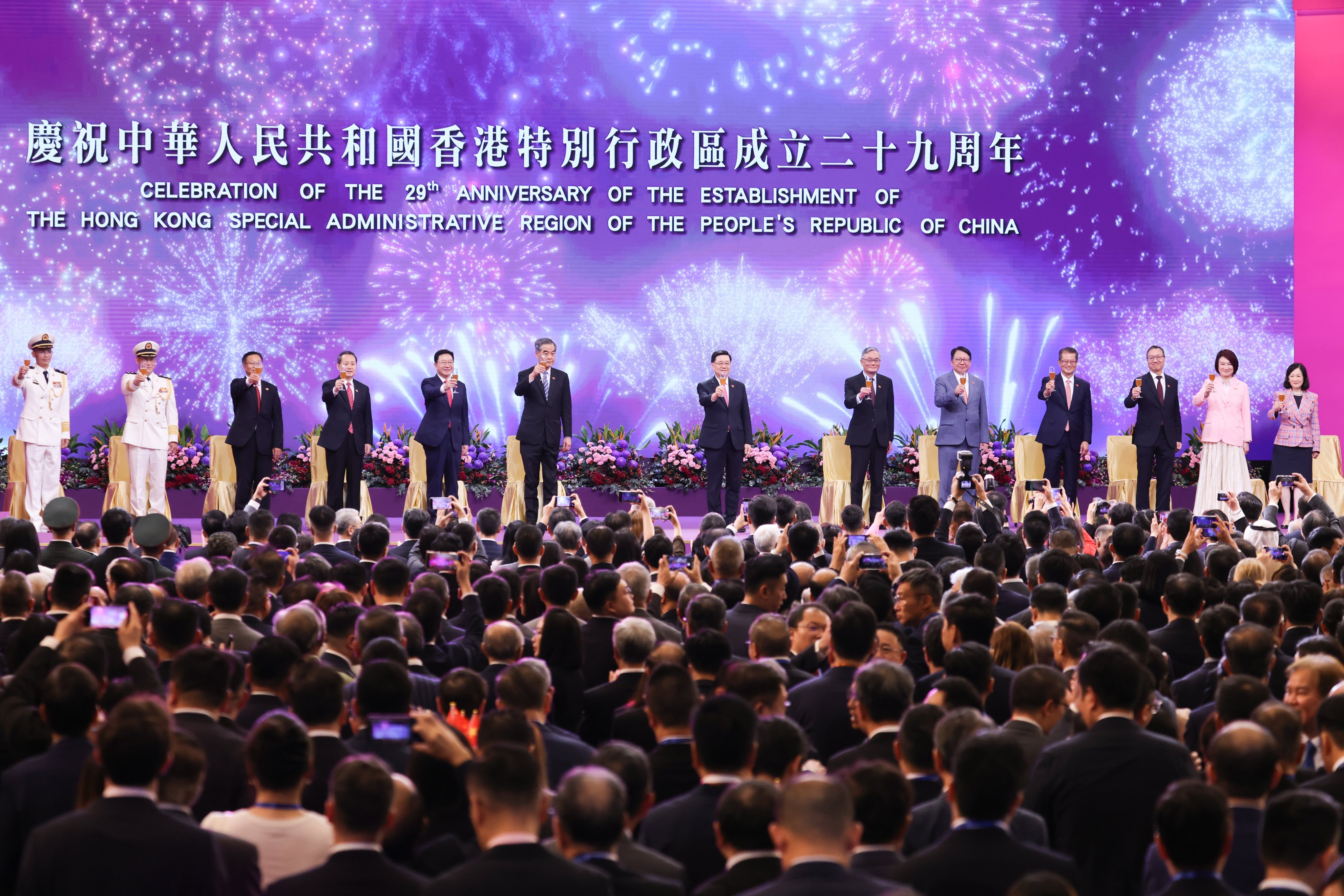 Government officials and residents celebrate the 29th anniversary of Hong Kong's return to Chinese rule at the Hong Kong Convention and Exhibition Centre on Wednesday. Photo: Nora Tam