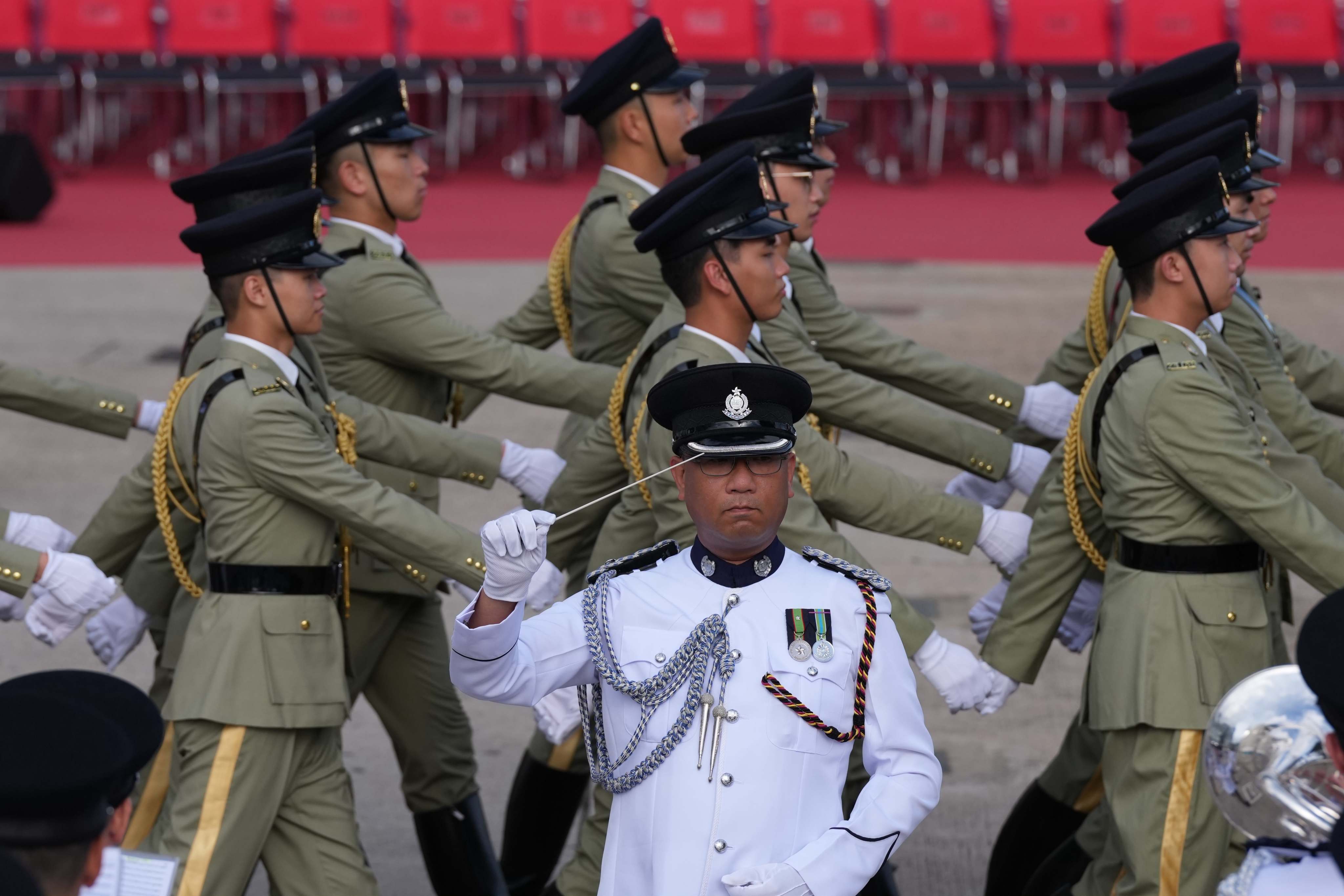 Handover celebrations kick off with a flag-raising ceremony. Photo: Karma Lo