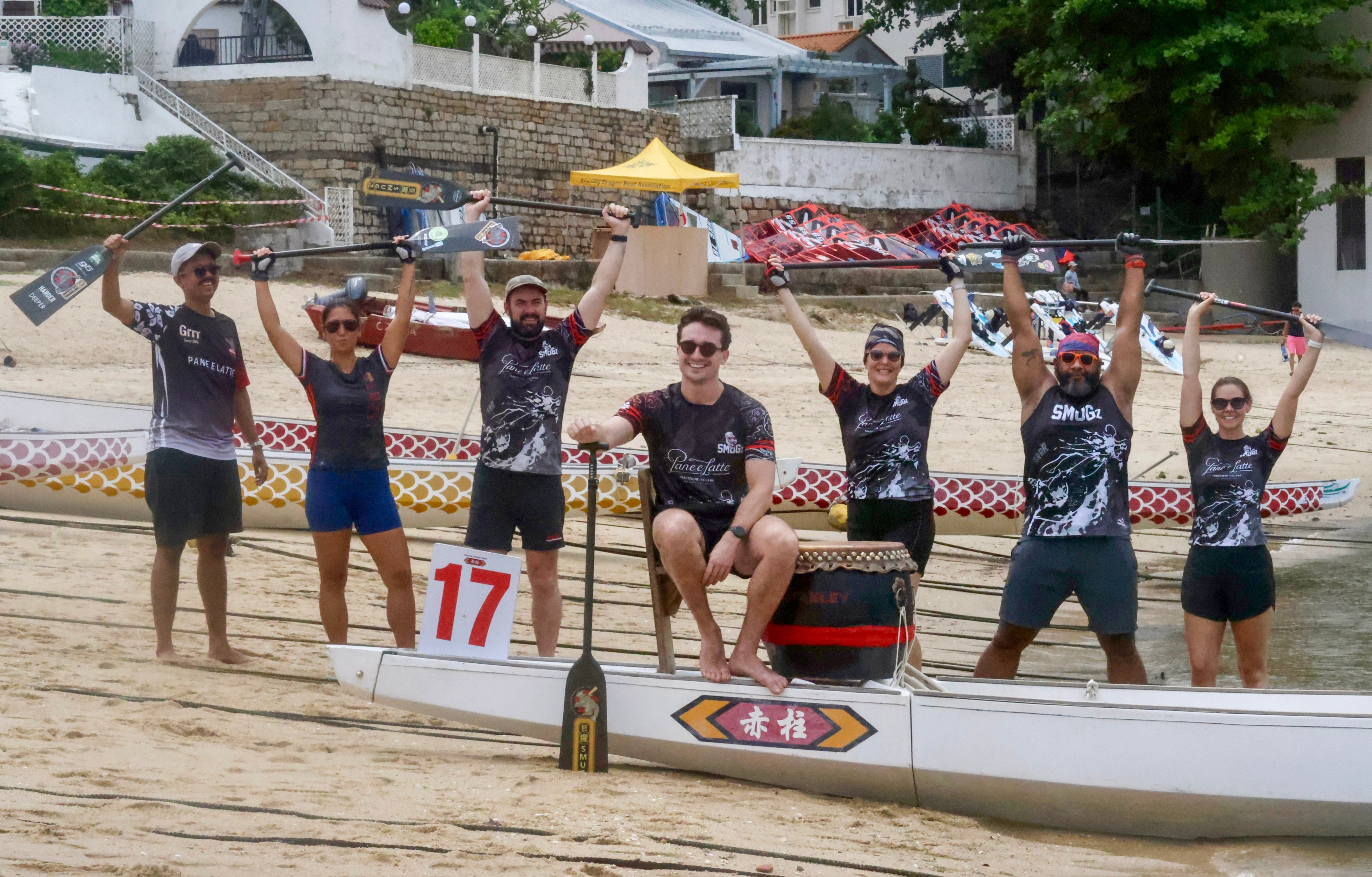 Tom Hutchins (centre) with his teammates at Stanley Dragon Boat Training Centre. Photo: Jonathan Wong