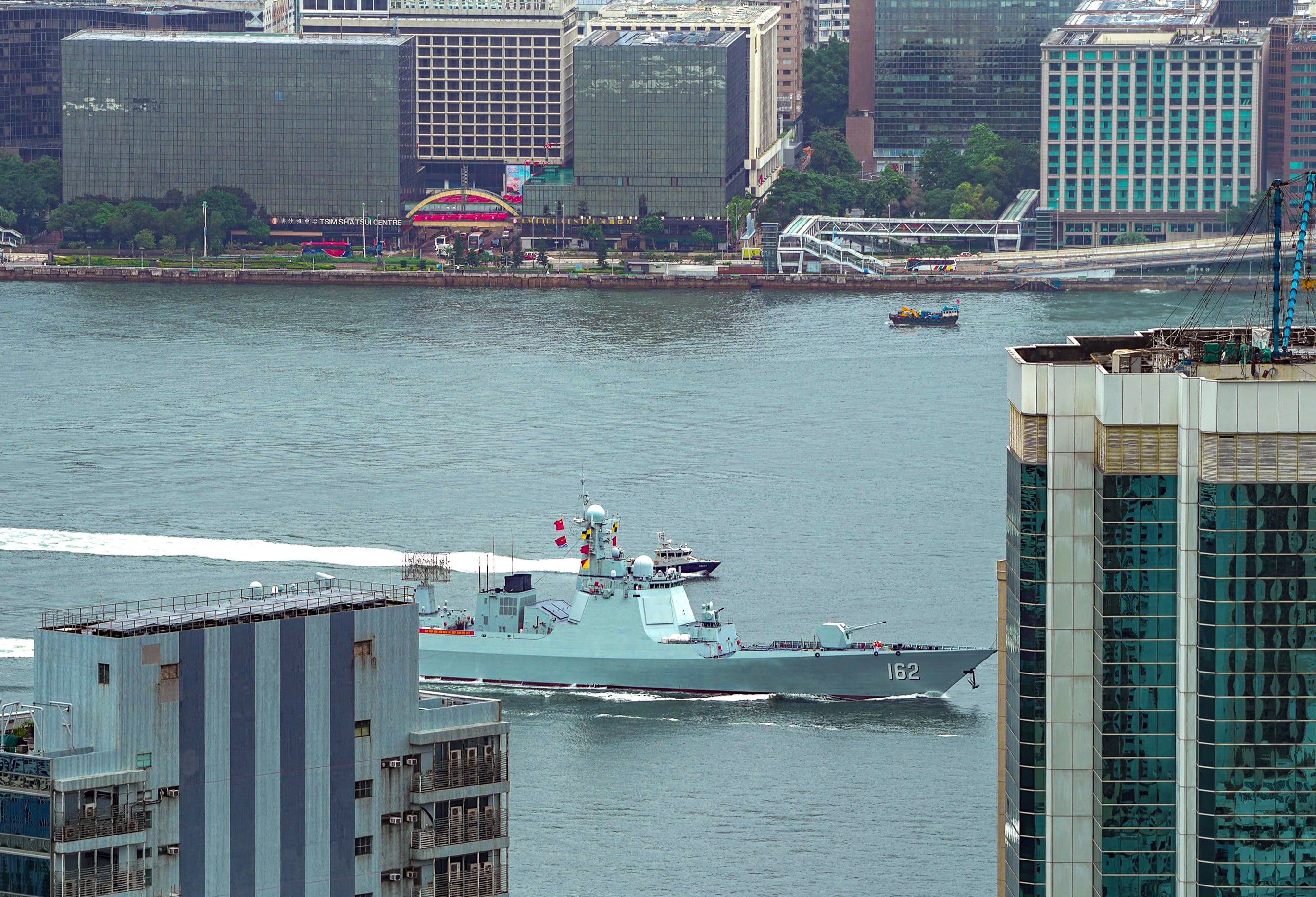 Guided-missile destroyer Nanning departs Hong Kong. Photo: Robert Ng