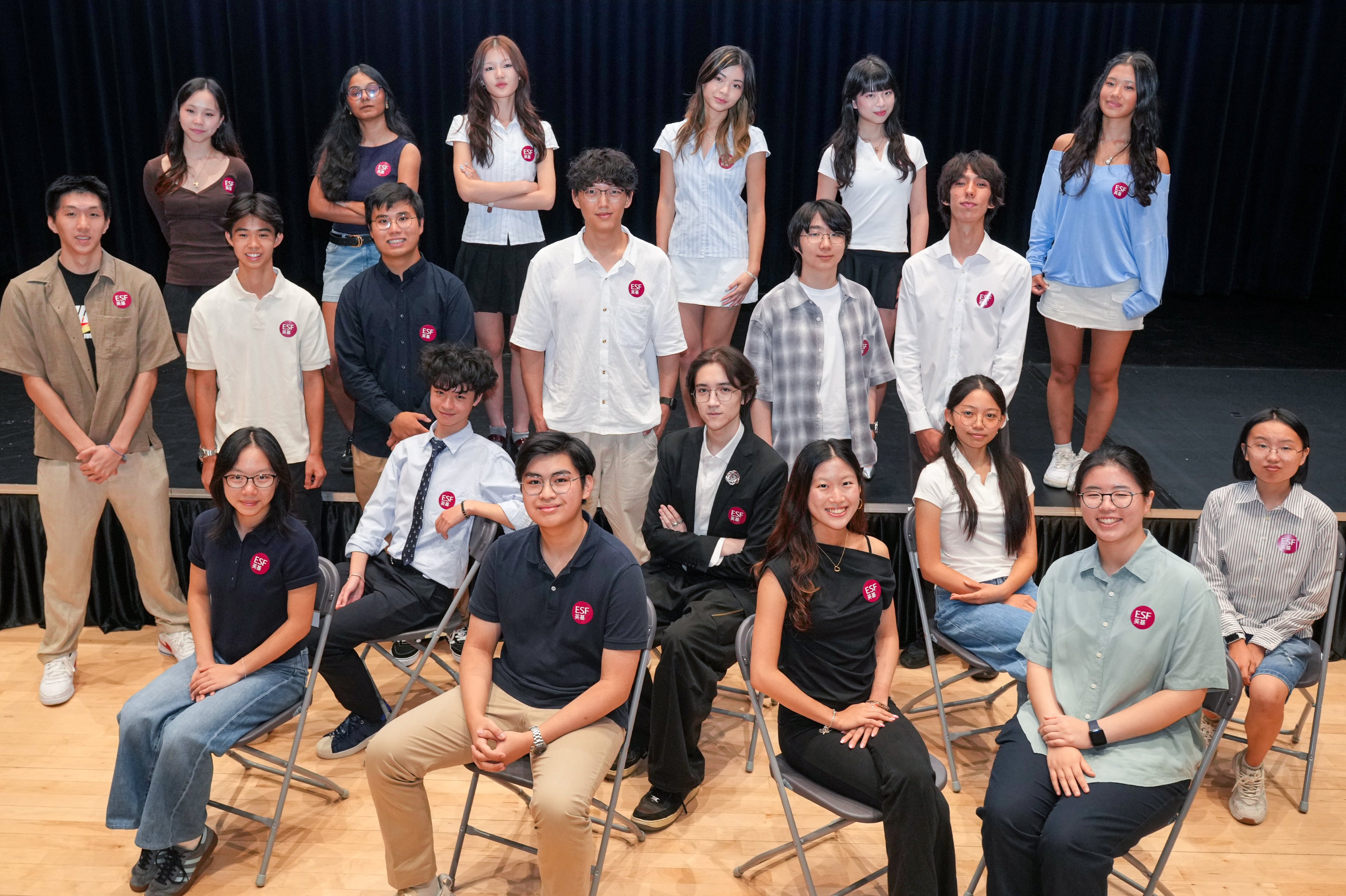 Twenty top IB scorers from the ESF pose for a photo at Island School. Photo: May Tse