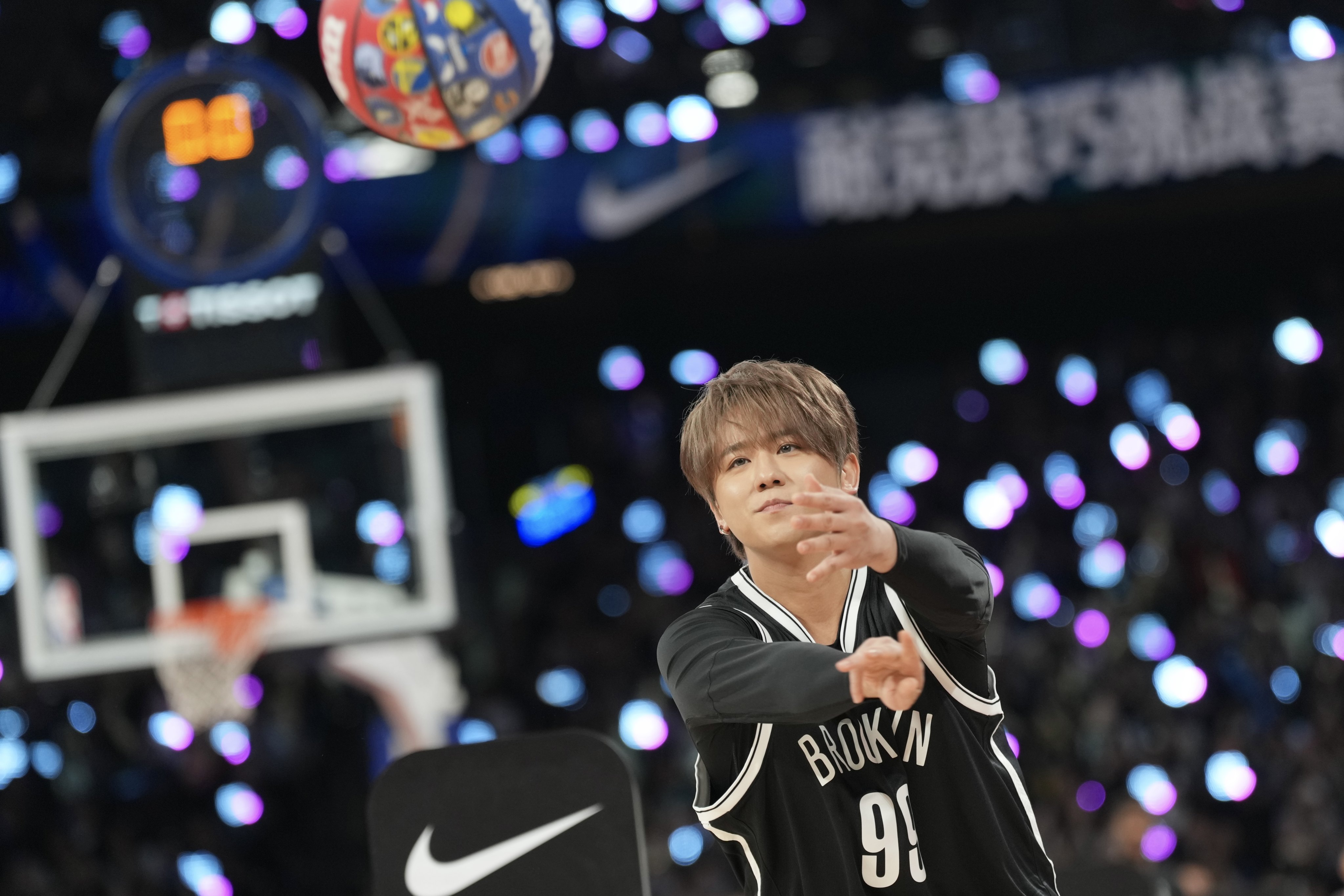 Keung To takes part in a skills challenge game during NBA Fan Day at The Venetian Arena in Macau last year. Photo: Karma Lo
