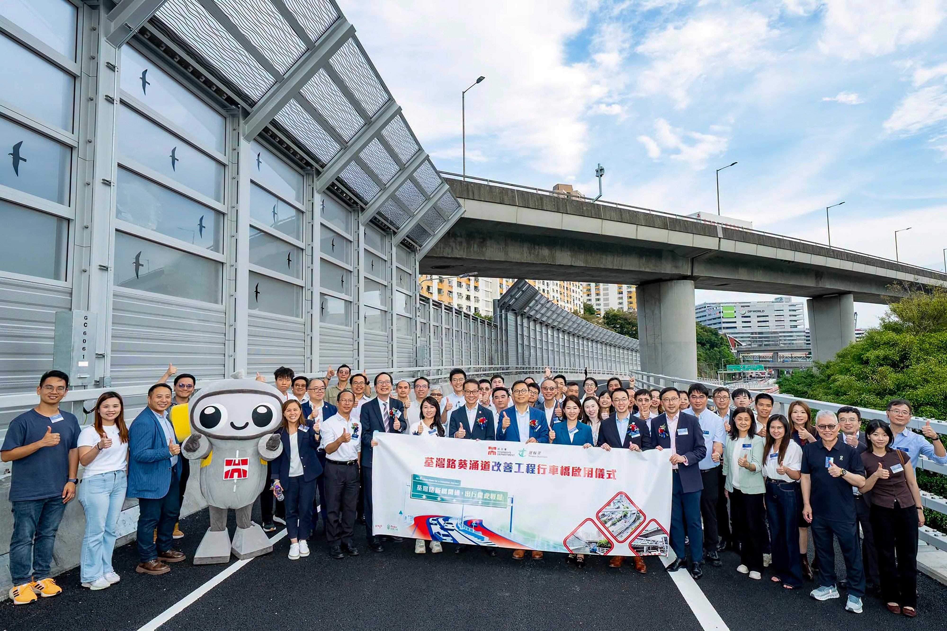 Highways Department officials and lawmakers attend the opening ceremony for the new bridge on Tsuen Wan Road on July 9. Photo: Facebook/Highways Department