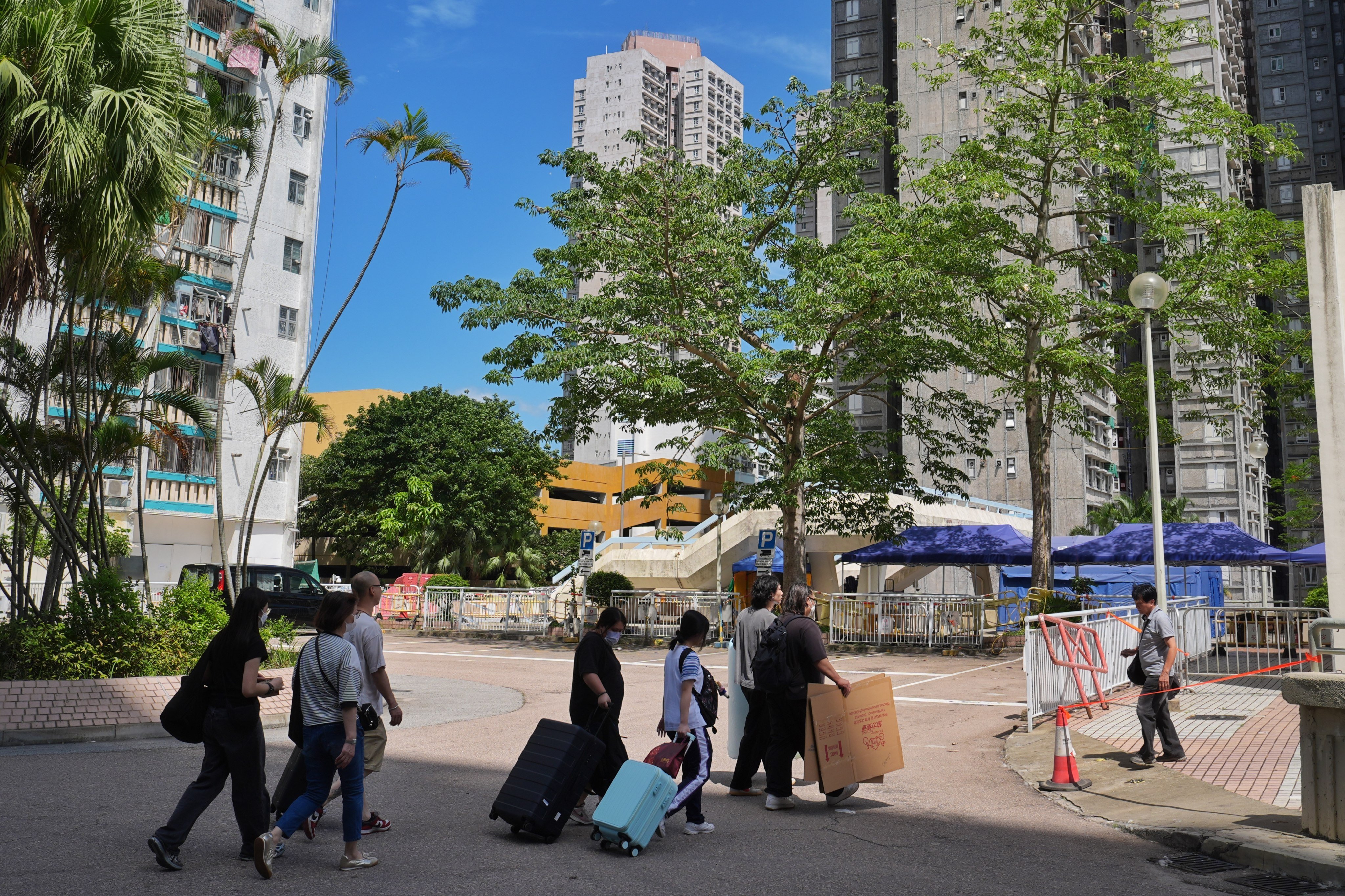 Residents of Wang Chi House return to collect their belongings in May. Photo: Elson Li