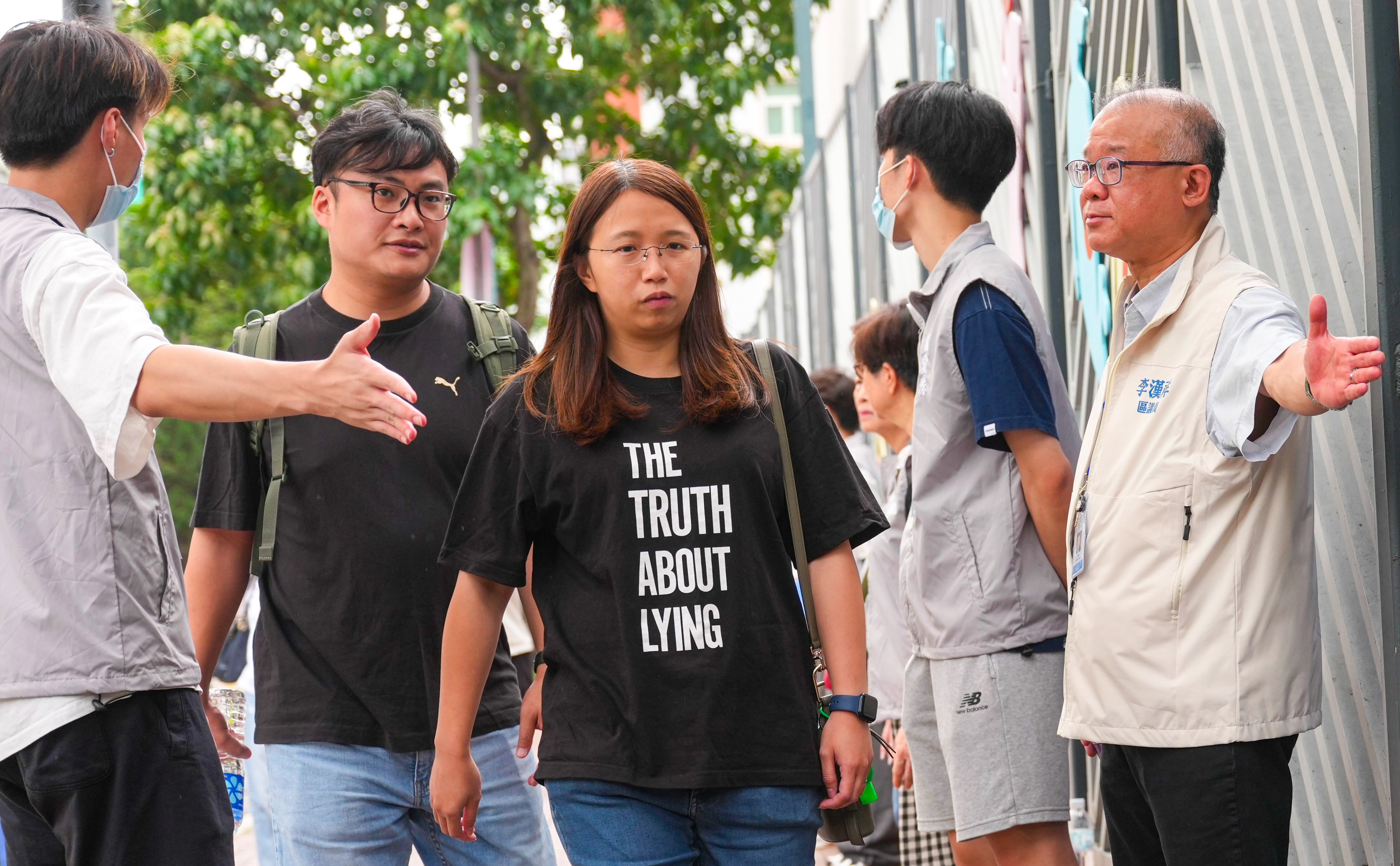 Wang Fuk Court home owners arrive for the extraordinary general at the Tai Po Community Centre. Photo: Karma Lo