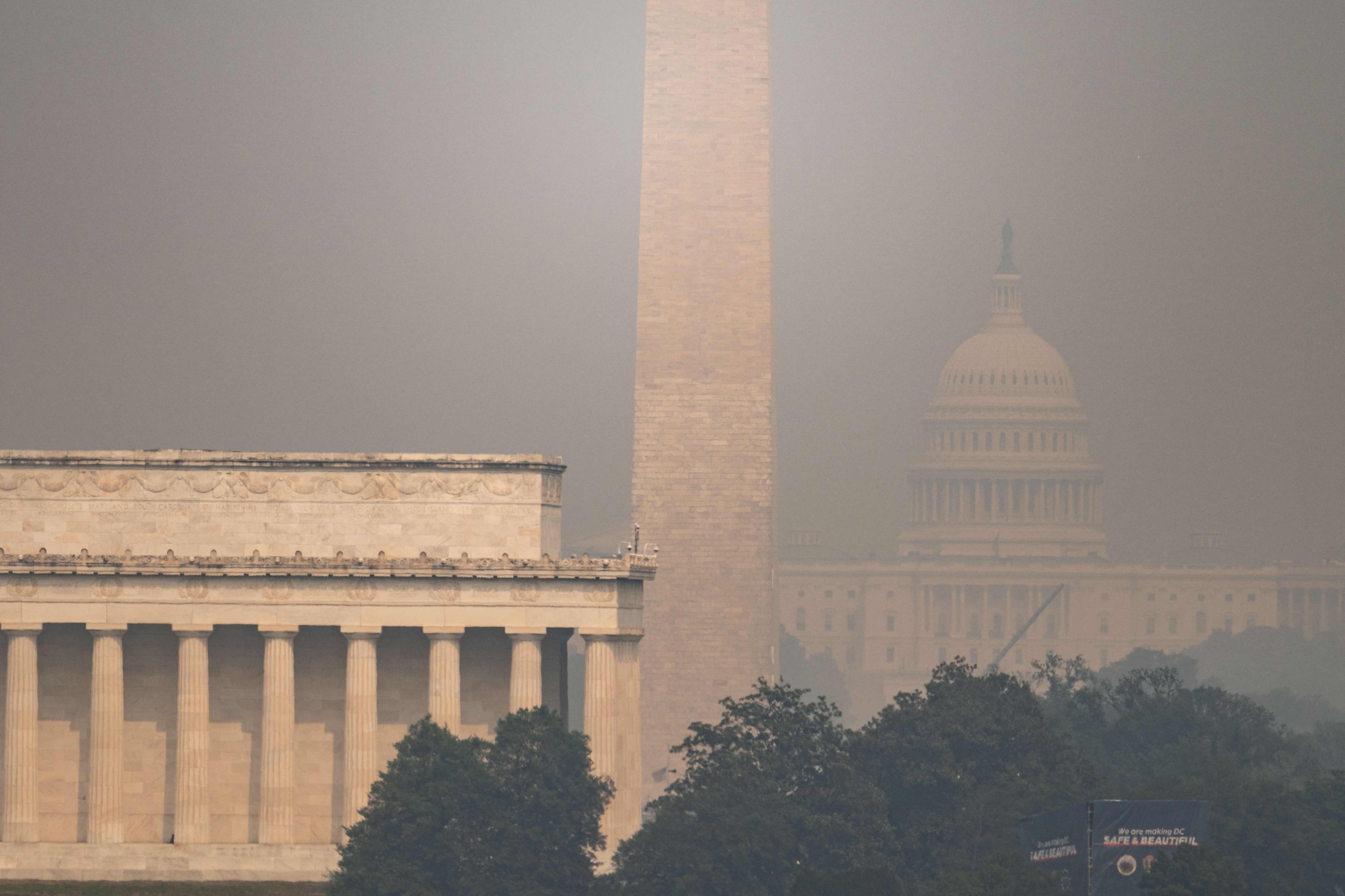The US Capitol, Washington Monument and Lincoln Memorial are seen through haze caused by wildfire smoke from Canada on Friday. Photo: AFP
