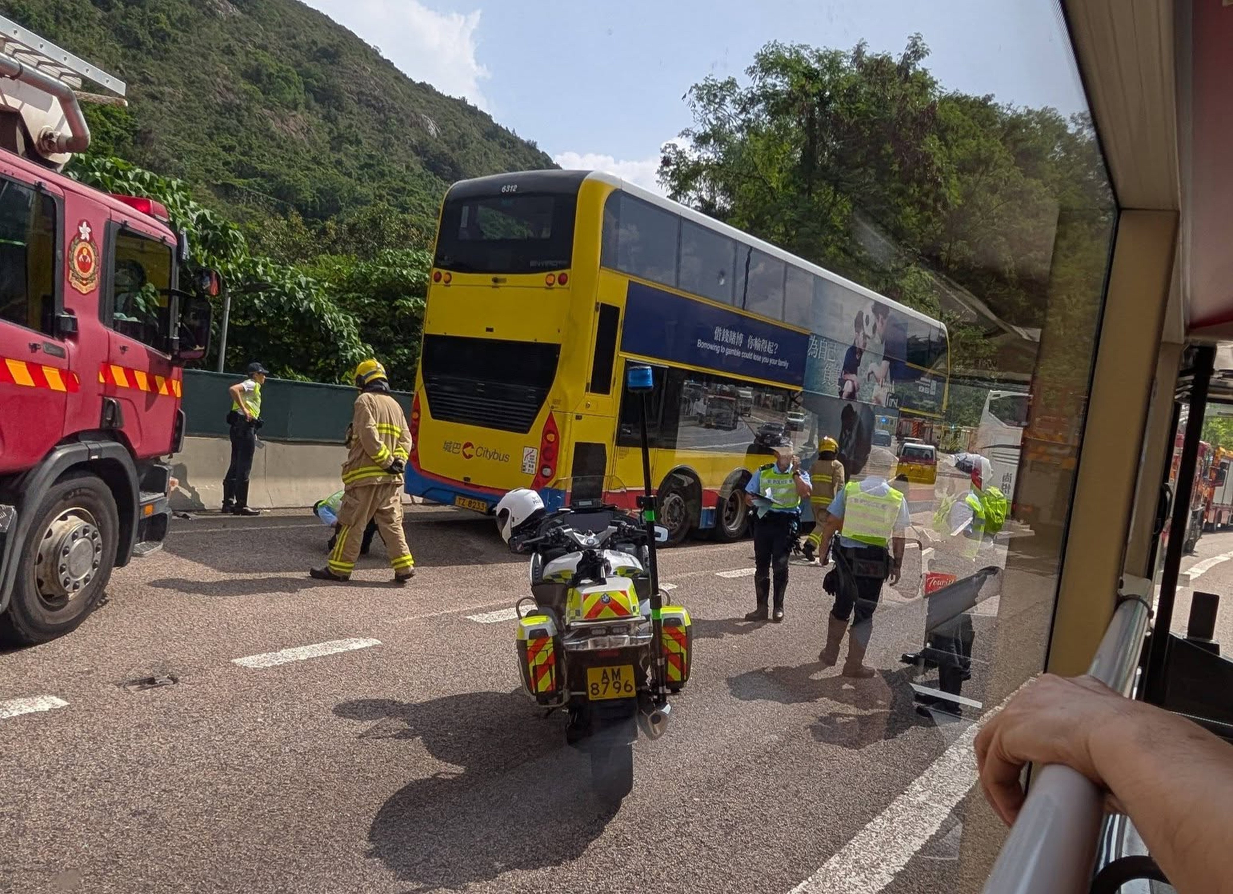 At least 10 people have been injured after a bus crashed into a road barrier. Photo: Handout