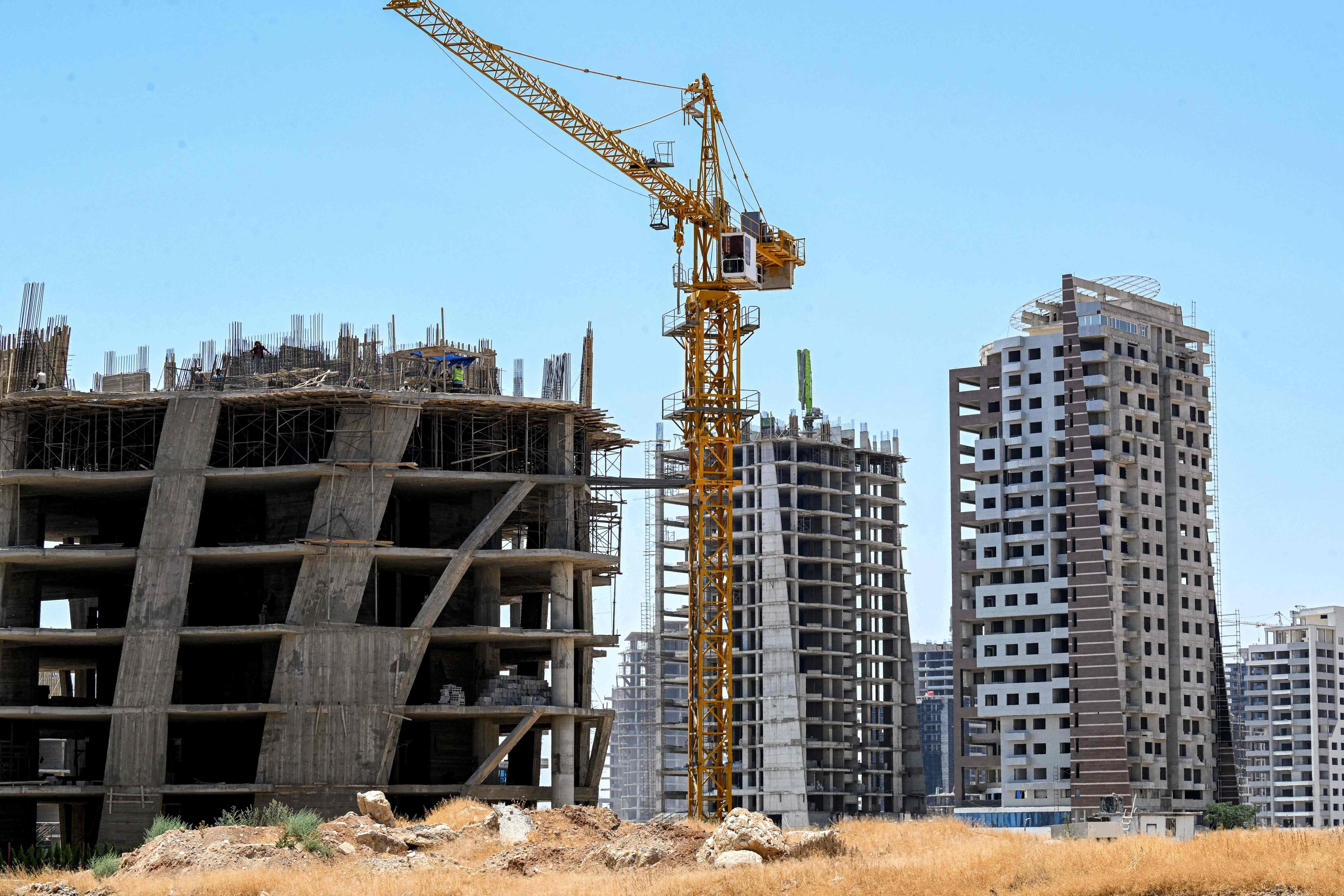Construction work is seen at a new mixed-use development project near Umayyad Square in Damascus, Syria, on Wednesday. Photo: AFP